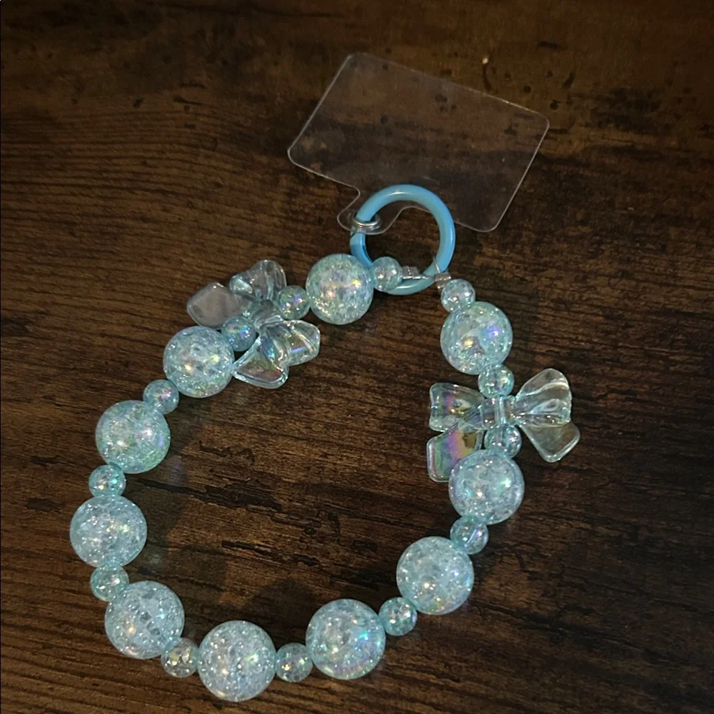 Glittery Blue Beaded Wrist Lanyard with Bow Accents